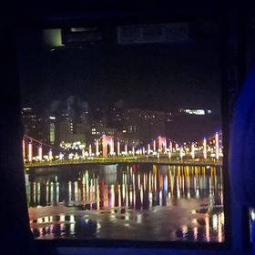 pittsburgh bridge lit up at night