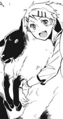 finnian smiling and holding a sheep