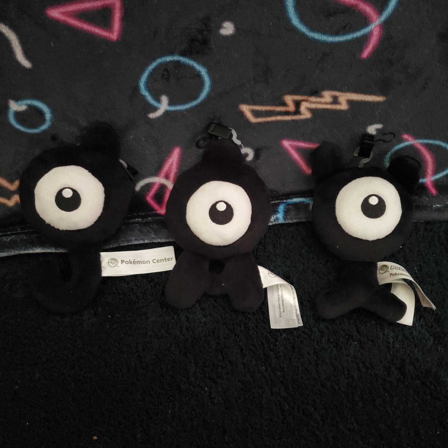 three unown plush