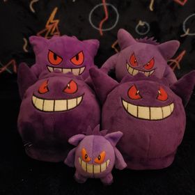 three gengar plush and a pair of gengar slippers