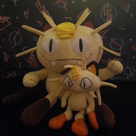 two meowth plush