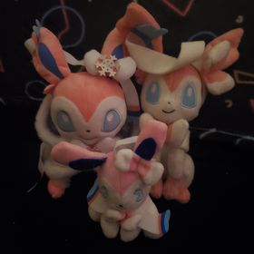 three sylveon plush