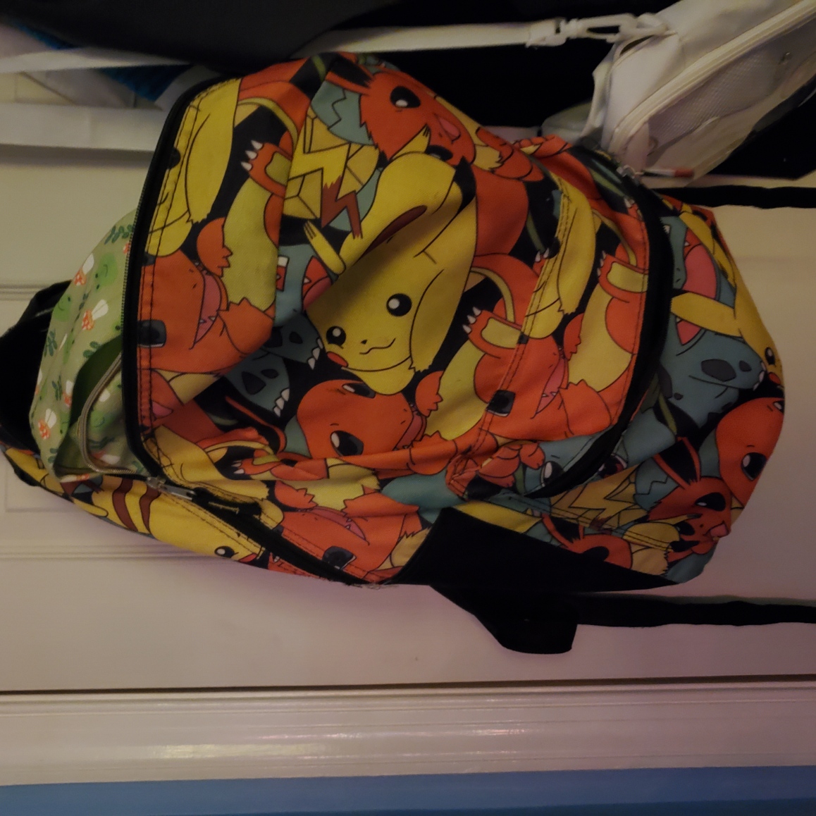 pikachu, charmander, bulbasaur, squirtle, and eevee backpack