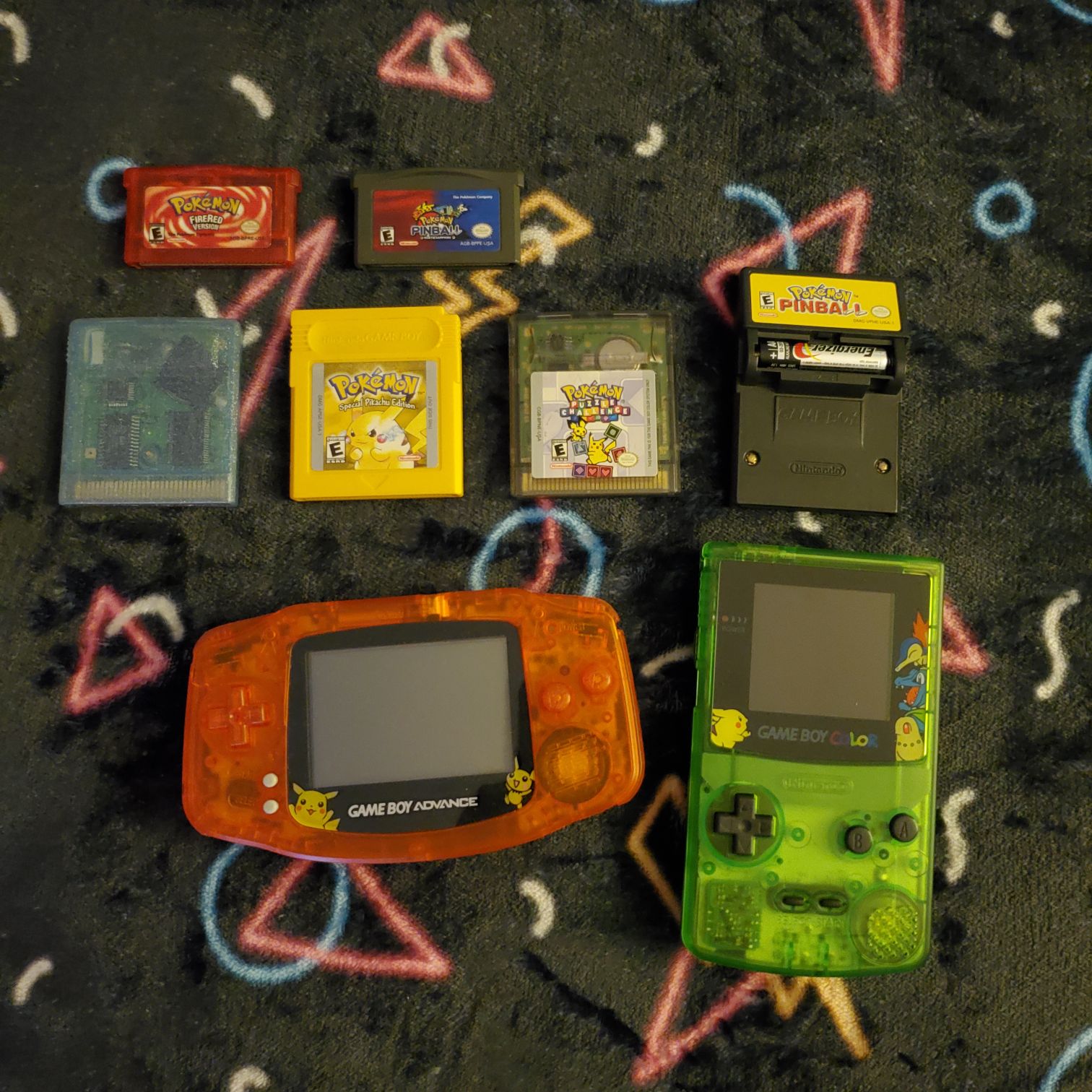 Pokemon Fire Red, Pinball: Ruby and Sapphire, Crystal, Yellow, Puzzle Challenge, Pinball, as well as two pokemon-themed gameboy systems