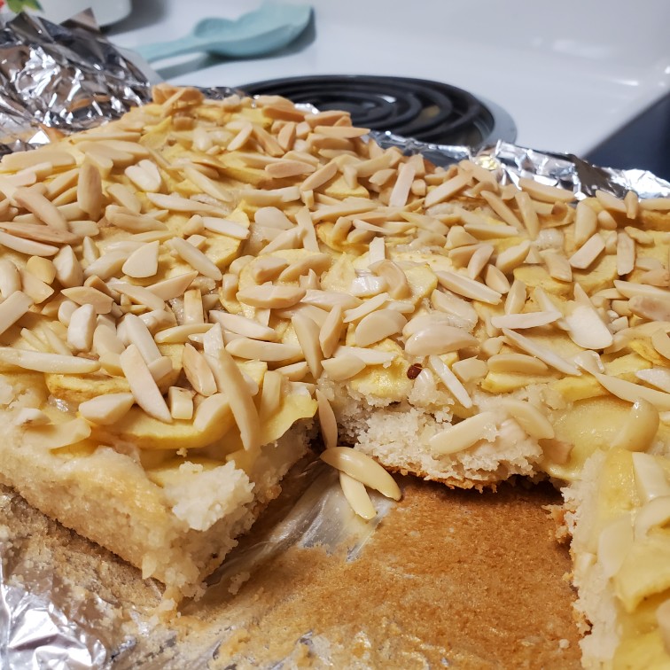 cut almond bar pieces on tin foil